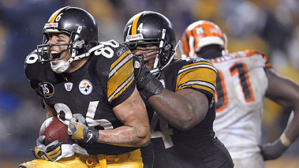 Hines Ward celebrates with Willie Colon after scoring his second touchdown of the night in the third quarter, breaking John Stallworth's team career touchdown receptions record. (vs. Bengals 12/02/2007)