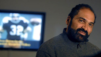 Steelers great Franco Harris spoke about the "Immaculate Reception" while a videotape of the famous play looped in the background at the Senator John Heinz History Center in the Strip District on Friday, Dec. 21, 2007.